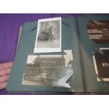 A Vintage Postcard Album containing many early Military Real Black & White cards