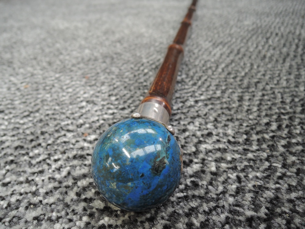 A bamboo walking cane with HM knopp ( marks worn ) holding polished ball handle Lapis Lazuli