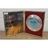 'A kind of magic' framed disc and Freddie photo.
