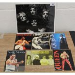 A collection of postcards and Bohemian rhapsody photo.
