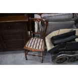 A Victorian mahogany bedroom chair with woolwork seat