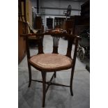 An Edwardian corner chair