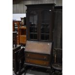 An early 20th Century mahogany bureau bookcase , approx. Height 205cm, width 76cm