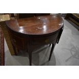 A Regency style mahogany and inlaid half moon sideboard, width approx. 93cm