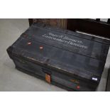 A vintage wooden travel trunk bearing military stamp, named for Major R Howarth, Lancashire