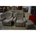A traditional three piece suite and footstool, very clean, looks nice quality