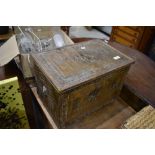 A vintage brass slipper or kindling box