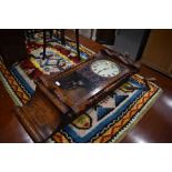 A 19th Century wall clock in marquetry work case