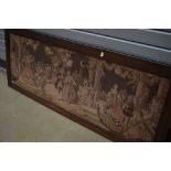 A vintage oak framed tapestry panel, depicting courtship scene, dancing in the moonlight, approx.