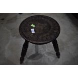 A 19th Century stained frame carved milking type stool