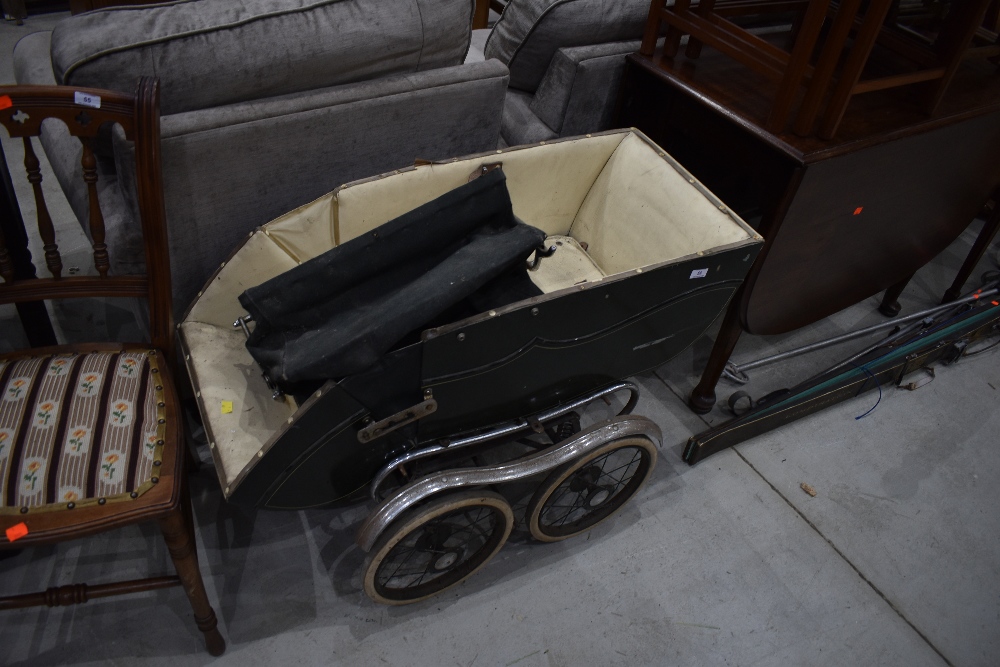 A vintage pram/pushchair