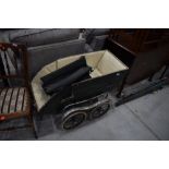 A vintage pram/pushchair