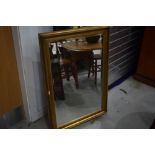 A large gilt frame wall mirror, chip to gilt on one side, approx. 75 x 107cm