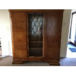 A vintage German walnut cupboard, labelled Pasche, having central display section, has been dismantl