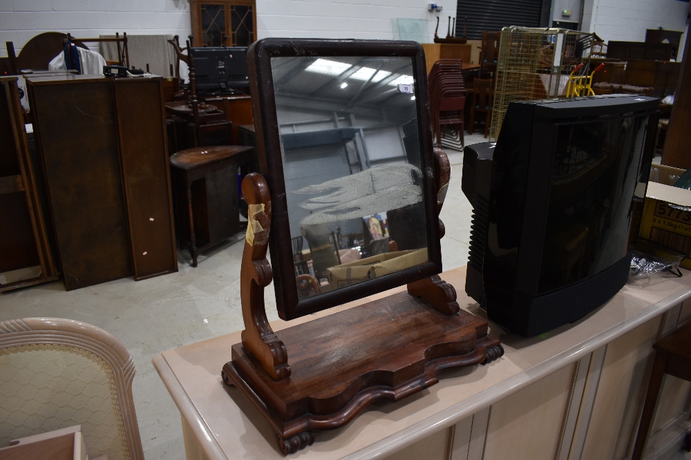 A Victorian mahogany toilet mirror on shaped base width approx. 55cm