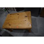 A solid pine coffee table, approx. 85 x 58cm