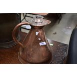 A vintage copper jug and glass measure