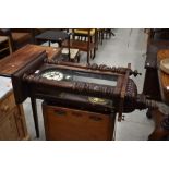 An early to mid 20th Century mahogany cased Vienna wall clock