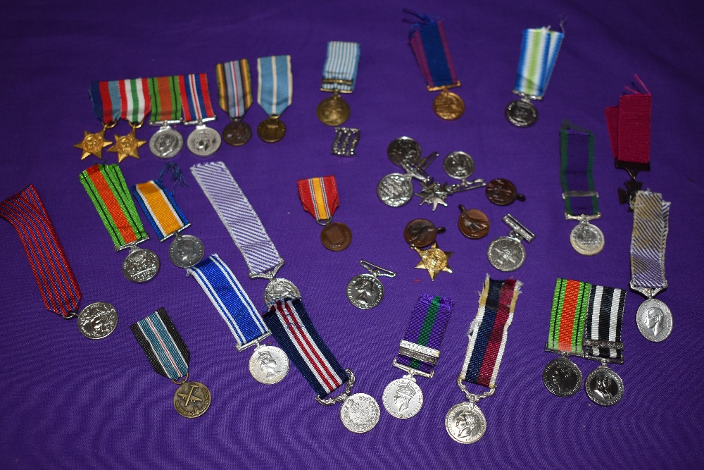 A Collection of mixed vintage Miniature and Full Size Medals some with ribbons