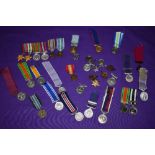 A Collection of mixed vintage Miniature and Full Size Medals some with ribbons