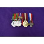 A WW2 group of 4 medals, Defence Medal, War Medal with Gloucestershire Regiment and Suffolk Regiment