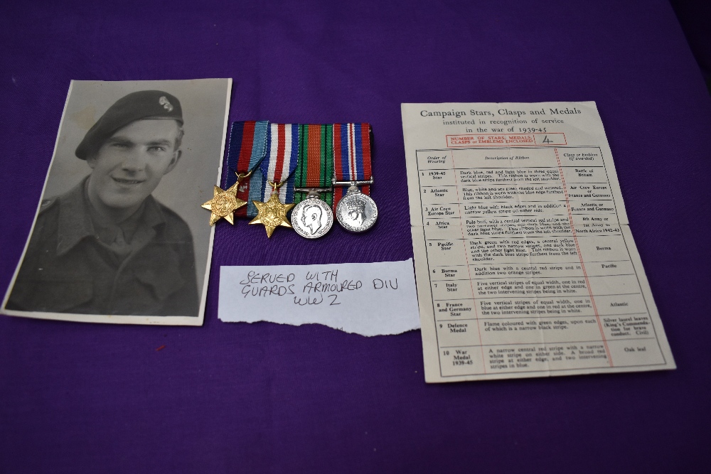 A group of four WW2 miniature medals, 39-45 Star, France Germany Star, War Medal and Defence Medal