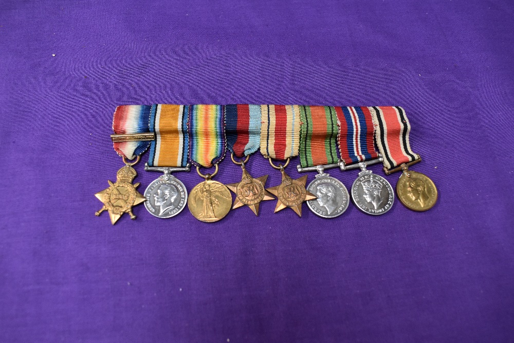 A group of WW1 and WW2 miniature medals, 1914-15 Star with clasp 5th Aug-22 Nov 1914, War Medal,