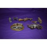 A collection of WW1 Trench Art including German Tri-Plane, Loius Machine Gun, British Tank, Shrapnel