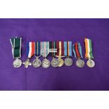 A group of six miniature medals, General Service Cross, National Service Medal, British Army of