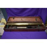 A vintage brass three drawer telescope by Reynolds & Branson of Leeds, with brass stand and in a