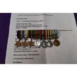A group of WW2 and onwards miniature medals to George Christie with paperwork, 39-45 Star,