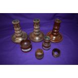 Seven pieces of treen, candlesticks from the teak of HMS Birmingham and HMS Ganges, HMS Ajax,