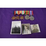 A WW2 group of Medals with photo's , 1939/45 Star, Africa Star, Italy Star, Defence Medal and War