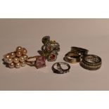 Seven assorted white metal dress and band rings stamped 925 including multi pearl, cubic zirconia,