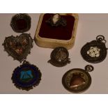 A small selection of HM silver and white metal including a cameo ring, marcasite ring and medalions