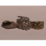 Three lady's silver and gold plate on silver dress rings having cubic zirconia decoration