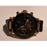 A gents Guess collection GC chronograph quartz wrist watch no: 53559 having a baton & Roman