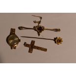 A small selection of 9ct gold and yellow metal stamped 9ct including cross pendant, bar brooch,