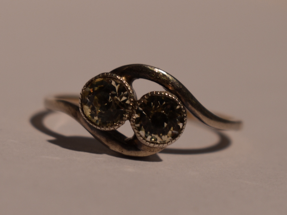 A lady's dress ring having a duo of spinels in collared mounts to cross over shoulders on a yellow - Image 2 of 2