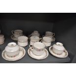 Nine Paragon cups and saucers in the Belinda pattern.