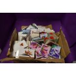 A box full of unused floristry gift cards.