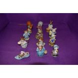 A collection of twelve Beswick Beatrix Potter figures, Amiable Guinea-Pig, Aunt Pettitoes, Tom