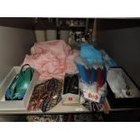 A mixed lot of vintage and retro items including shoes,fabric and jewellery.