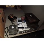 A selection of items including Milo binoculars, vintage Kodak camera, stud box, handkerchiefs, and a