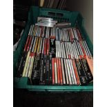 A crate of compact discs of classical interest.