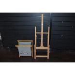 An easel and a knitting bag.