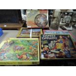 A colletion of vintage jigsaws and games.