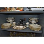 A good quantity of French plates and cake stands having floral pattern and gilt detailing,two