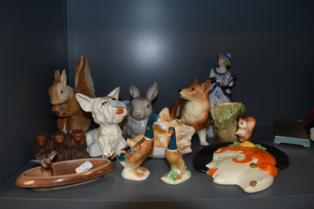 A mixed lot of vintage ceramics including Crown Devon Westie,ducks,corgi and more,also a stylised