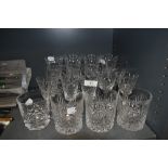 A selection of moulded drinks glasses,including wine glasses and tumblers.